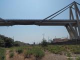Foto Documentation August 2015 : The section of Morandi Polcevera bridge collapsed on August 14, 2018.  The tower number 9 on the right disintegrated, while number 10 one on the left luckily still stands. Here it crosses a disused railway yard.